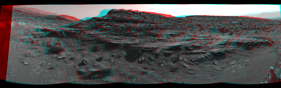 NASA's Mars rover Curiosity took 5 image pairs in Gale Crater using its mast-mounted Navigation Camera (Navcam) to create this mosaic. The seam-corrected mosaic provides a 163-degree cylindrical perspective projection panorama of the Martian surface suitable for stereo viewing, centered at 90 degrees azimuth (measured clockwise from north). This anaglyph must be viewed with red/blue glasses (red over left eye). Curiosity took the images on July 17, 2015, Sol 1046 of the Mars Science Laboratory mission at drive 2224, site number 48. The local mean solar time for the image exposures was 3 PM. Each Navcam image has a 45-degree field of view. CREDIT: NASA/JPL-Caltech