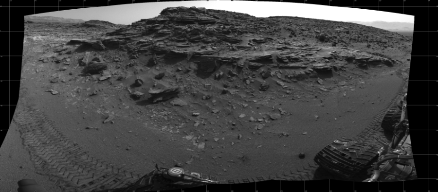 NASA's Mars rover Curiosity took 10 images in Gale Crater using its mast-mounted Left Navigation Camera (Navcam) to create this mosaic. The seam-corrected mosaic provides a 178-degree cylindrical projection panorama of the Martian surface centered at 245 degrees azimuth (measured clockwise from north). Curiosity took the images on July 17, 2015, Sol 1046 of the Mars Science Laboratory mission at drive 2224, site number 48. The local mean solar time for the image exposures was 3 PM. Each Navcam image has a 45 degree field of view. CREDIT: NASA/JPL-Caltech