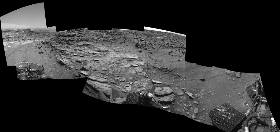 NASA's Mars rover Curiosity took 11 images in Gale Crater using its mast-mounted Left Navigation Camera (Navcam) to create this mosaic. The seam-corrected mosaic provides a 269-degree cylindrical-perspective projection panorama of the Martian surface suitable for stereo viewing, centered at 51 degrees azimuth (measured clockwise from north). This single-eye view must be combined with the partner right image to be viewed in stereo.  Curiosity took the images on August 06, 2015, Sol 1066 of the Mars Science Laboratory mission at drive 2794, site number 48. The local mean solar time for the image exposures was 2 PM. Each Navcam image has a 45-degree field of view. CREDIT: NASA/JPL-Caltech