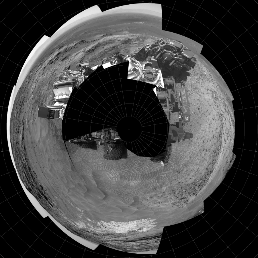 NASA's Mars rover Curiosity took 19 images in Gale Crater using its mast-mounted Left Navigation Camera (Navcam) to create this mosaic. The seam-corrected mosaic provides a polar stereographic projection panorama of the Martian surface with 0 degrees azimuth (measured clockwise from north) at the top of the image. Curiosity took the images on July 20, 2015, Sol 1049 of the Mars Science Laboratory mission at drive 2422, site number 48. The local mean solar time for the image exposures was 2 PM. Each Navcam image has a 45-degree field of view. CREDIT: NASA/JPL-Caltech