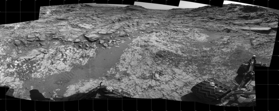 NASA's Mars rover Curiosity took 11 images in Gale Crater using its mast-mounted Left Navigation Camera (Navcam) to create this mosaic. The seam-corrected mosaic provides a 192-degree cylindrical projection panorama of the Martian surface centered at 212 degrees azimuth (measured clockwise from north). Curiosity took the images on August 08, 2015, Sol 1067 of the Mars Science Laboratory mission at drive 0, site number 49. The local mean solar time for the image exposures was from 2 PM to 3 PM. Each Navcam image has a 45 degree field of view. CREDIT: NASA/JPL-Caltech