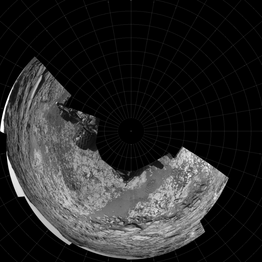 NASA's Mars rover Curiosity took 11 images in Gale Crater using its mast-mounted Left Navigation Camera (Navcam) to create this mosaic. The seam-corrected mosaic provides a polar stereographic projection panorama of the Martian surface with 0 degrees azimuth (measured clockwise from north) at the top of the image. Curiosity took the images on August 08, 2015, Sol 1067 of the Mars Science Laboratory mission at drive 0, site number 49. The local mean solar time for the image exposures was from 2 PM to 3 PM. Each Navcam image has a 45-degree field of view. CREDIT: NASA/JPL-Caltech