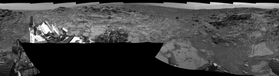 NASA's Mars rover Curiosity took 17 images in Gale Crater using its mast-mounted Left Navigation Camera (Navcam) to create this mosaic. The seam-corrected mosaic provides a 360-degree cylindrical-perspective projection panorama of the Martian surface suitable for stereo viewing, centered at 329 degrees azimuth (measured clockwise from north). This single-eye view must be combined with the partner right image to be viewed in stereo.  Curiosity took the images on August 13, 2015, Sol 1072 of the Mars Science Laboratory mission at drive 294, site number 49. The local mean solar time for the image exposures was 2 PM. Each Navcam image has a 45-degree field of view. CREDIT: NASA/JPL-Caltech