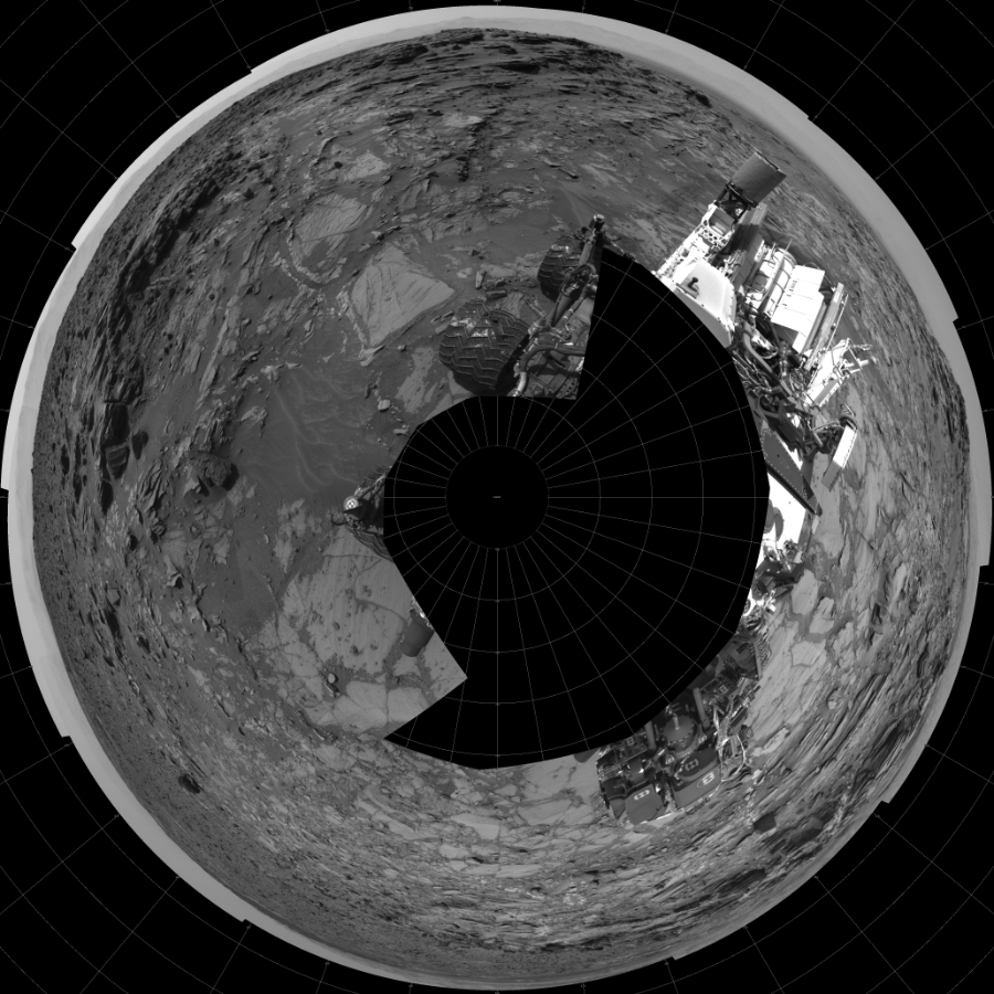 NASA's Mars rover Curiosity took 17 images in Gale Crater using its mast-mounted Left Navigation Camera (Navcam) to create this mosaic. The seam-corrected mosaic provides a polar stereographic projection panorama of the Martian surface with 0 degrees azimuth (measured clockwise from north) at the top of the image. Curiosity took the images on August 13, 2015, Sol 1072 of the Mars Science Laboratory mission at drive 294, site number 49. The local mean solar time for the image exposures was 2 PM. Each Navcam image has a 45-degree field of view. CREDIT: NASA/JPL-Caltech
