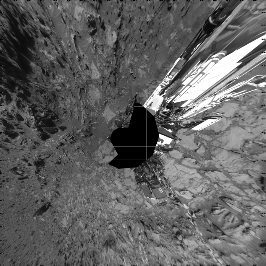 NASA's Mars rover Curiosity took 17 images in Gale Crater using its mast-mounted Left Navigation Camera (Navcam) to create this mosaic. The seam-corrected mosaic provides a vertical projection of the Martian surface near the rover, covering an area of 20 meters (north/south) by 20 meters (east/west). North is up in the image. This projection provides an overhead view, but introduces distortion for items not on the surface, such as large rocks and the rover itself.  Curiosity took the images on August 13, 2015, Sol 1072 of the Mars Science Laboratory mission at drive 294, site number 49. The local mean solar time for the image exposures was 2 PM. Each Navcam image has a 45-degree field of view. CREDIT: NASA/JPL-Caltech