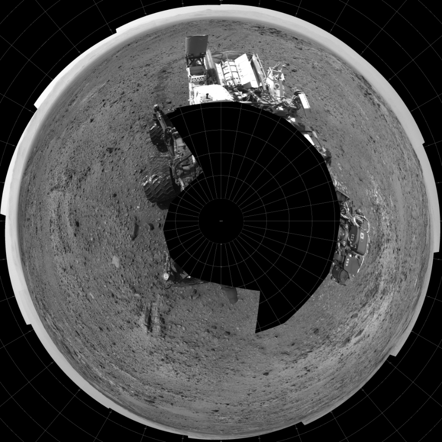 NASA's Mars rover Curiosity took 17 images in Gale Crater using its mast-mounted Left Navigation Camera (Navcam) to create this mosaic. The seam-corrected mosaic provides a polar stereographic projection panorama of the Martian surface with 0 degrees azimuth (measured clockwise from north) at the top of the image. Curiosity took the images on August 14, 2015, Sol 1073 of the Mars Science Laboratory mission at drive 642, site number 49. The local mean solar time for the image exposures was 2 PM. Each Navcam image has a 45-degree field of view. CREDIT: NASA/JPL-Caltech