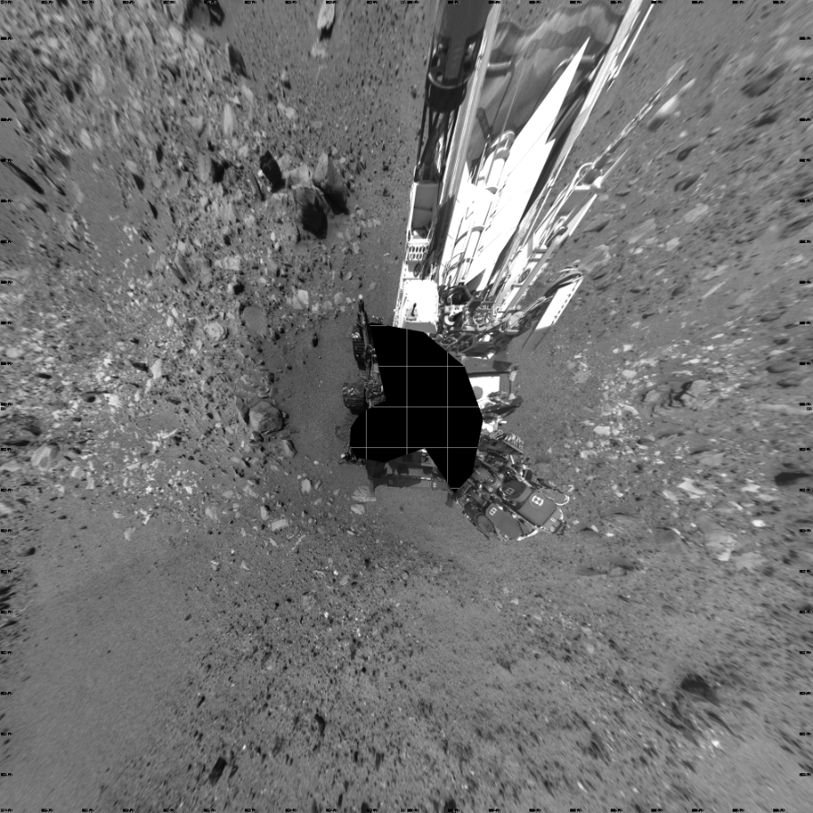 NASA's Mars rover Curiosity took 19 images in Gale Crater using its mast-mounted Left Navigation Camera (Navcam) to create this mosaic. The seam-corrected mosaic provides a vertical projection of the Martian surface near the rover, covering an area of 20 meters (north/south) by 20 meters (east/west). North is up in the image. This projection provides an overhead view, but introduces distortion for items not on the surface, such as large rocks and the rover itself.  Curiosity took the images on August 15, 2015, Sol 1074 of the Mars Science Laboratory mission at drive 814, site number 49. The local mean solar time for the image exposures was 1 PM. Each Navcam image has a 45-degree field of view. CREDIT: NASA/JPL-Caltech