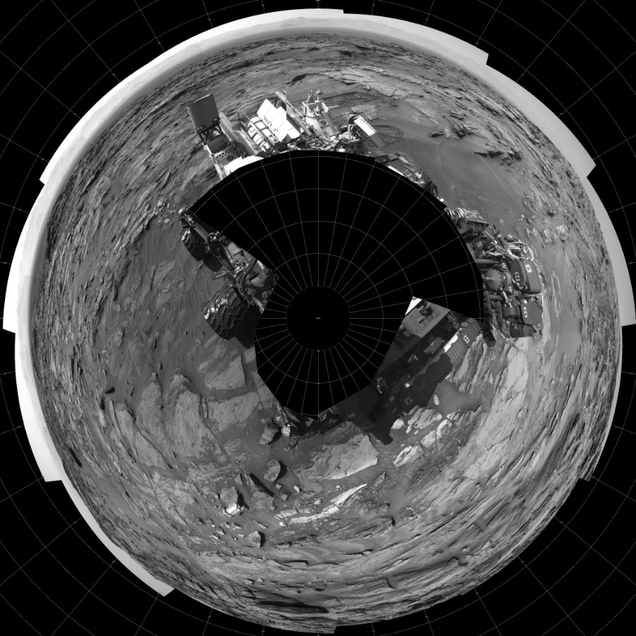NASA's Mars rover Curiosity took 19 images in Gale Crater using its mast-mounted Left Navigation Camera (Navcam) to create this mosaic. The seam-corrected mosaic provides a polar stereographic projection panorama of the Martian surface with 0 degrees azimuth (measured clockwise from north) at the top of the image. Curiosity took the images on August 28, 2015, Sol 1087 of the Mars Science Laboratory mission at drive 1876, site number 49. The local mean solar time for the image exposures was from 2 PM to 3 PM. Each Navcam image has a 45-degree field of view. CREDIT: NASA/JPL-Caltech