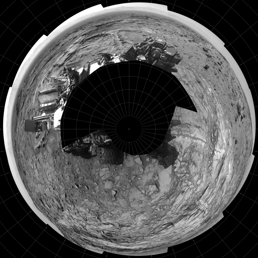 NASA's Mars rover Curiosity took 17 images in Gale Crater using its mast-mounted Left Navigation Camera (Navcam) to create this mosaic. The seam-corrected mosaic provides a polar stereographic projection panorama of the Martian surface with 0 degrees azimuth (measured clockwise from north) at the top of the image. Curiosity took the images on September 03, 2015, Sol 1093 of the Mars Science Laboratory mission at drive 2026, site number 49. The local mean solar time for the image exposures was 2 PM. Each Navcam image has a 45-degree field of view. CREDIT: NASA/JPL-Caltech