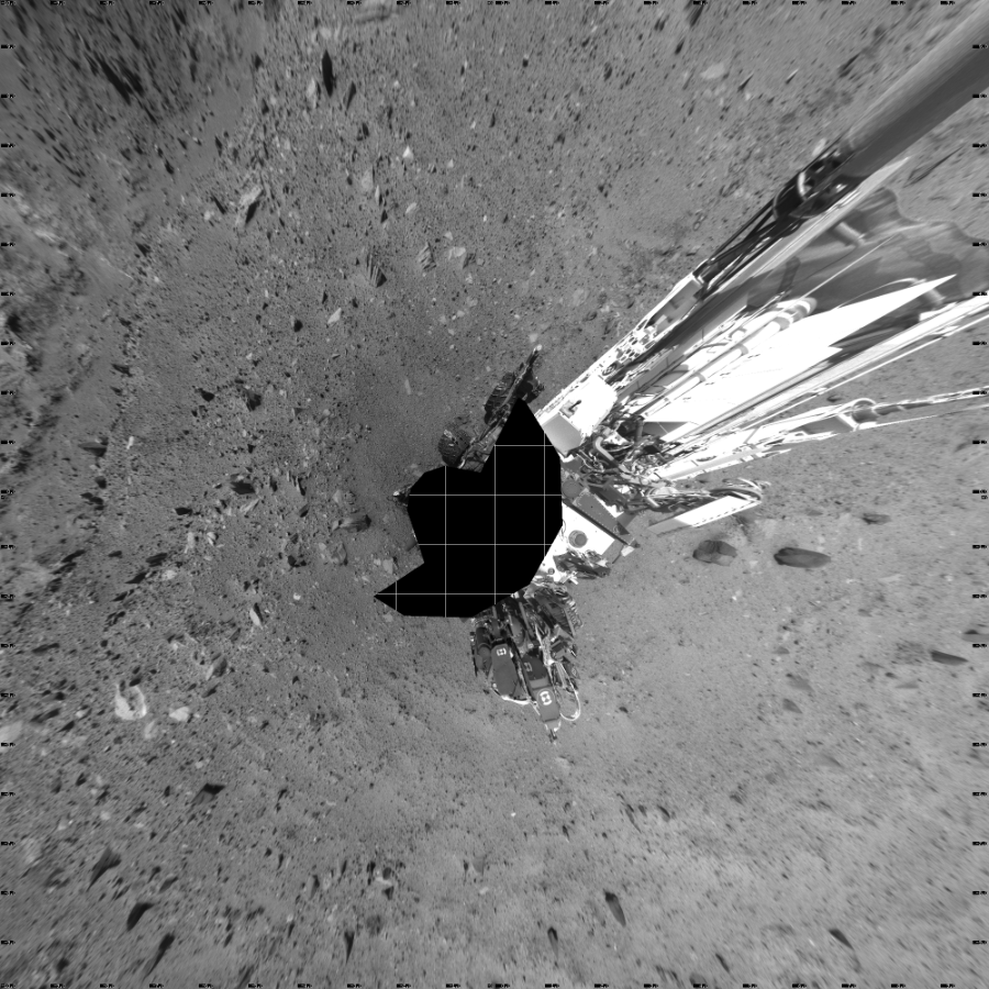 NASA's Mars rover Curiosity took 17 images in Gale Crater using its mast-mounted Left Navigation Camera (Navcam) to create this mosaic. The seam-corrected mosaic provides a vertical projection of the Martian surface near the rover, covering an area of 20 meters (north/south) by 20 meters (east/west). North is up in the image. This projection provides an overhead view, but introduces distortion for items not on the surface, such as large rocks and the rover itself.  Curiosity took the images on September 09, 2015, Sol 1099 of the Mars Science Laboratory mission at drive 2626, site number 49. The local mean solar time for the image exposures was 2 PM. Each Navcam image has a 45-degree field of view. CREDIT: NASA/JPL-Caltech