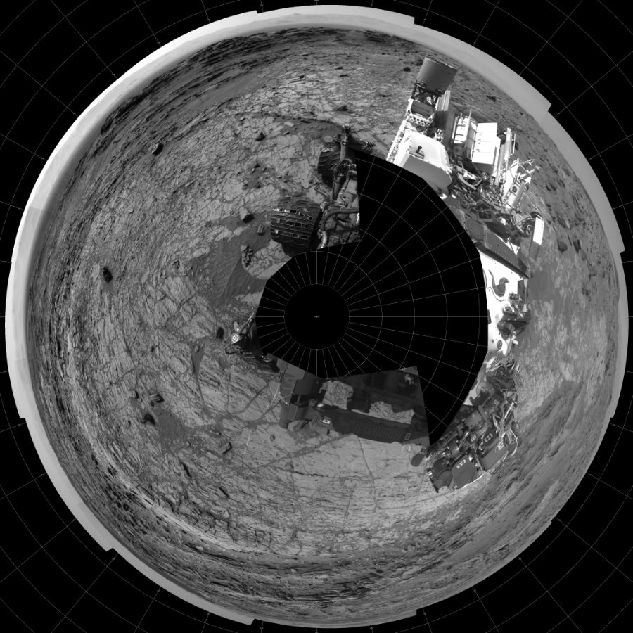 NASA's Mars rover Curiosity took 19 images in Gale Crater using its mast-mounted Left Navigation Camera (Navcam) to create this mosaic. The seam-corrected mosaic provides a polar stereographic projection panorama of the Martian surface with 0 degrees azimuth (measured clockwise from north) at the top of the image. Curiosity took the images on September 15, 2015, Sol 1104 of the Mars Science Laboratory mission at drive 0, site number 50. The local mean solar time for the image exposures was 2 PM. Each Navcam image has a 45-degree field of view. CREDIT: NASA/JPL-Caltech