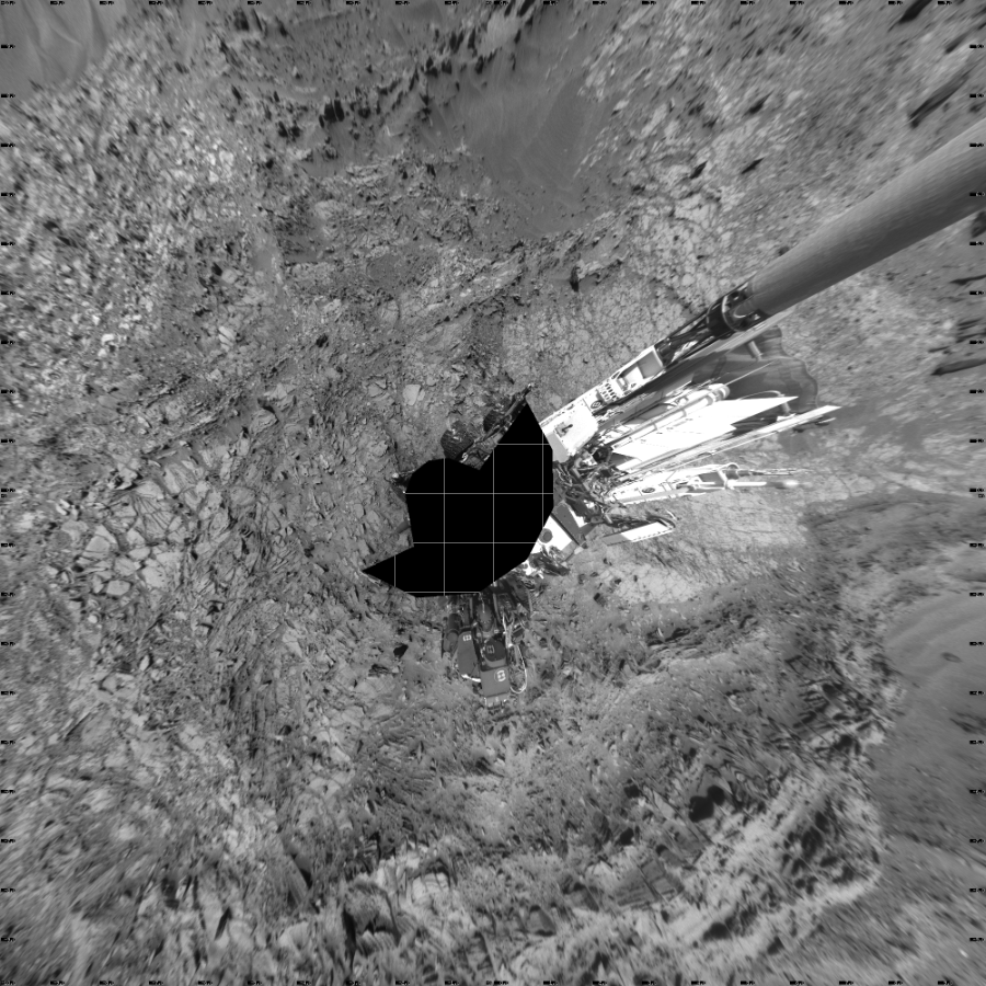 NASA's Mars rover Curiosity took 17 images in Gale Crater using its mast-mounted Left Navigation Camera (Navcam) to create this mosaic. The seam-corrected mosaic provides a vertical projection of the Martian surface near the rover, covering an area of 20 meters (north/south) by 20 meters (east/west). North is up in the image. This projection provides an overhead view, but introduces distortion for items not on the surface, such as large rocks and the rover itself. Curiosity took the images on September 17, 2015, Sol 1106 of the Mars Science Laboratory mission at drive 114, site number 50. The local mean solar time for the image exposures was from 1 PM to 2 PM. Each Navcam image has a 45-degree field of view. CREDIT: NASA/JPL-Caltech