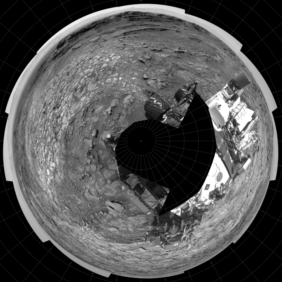 NASA's Mars rover Curiosity took 18 images in Gale Crater using its mast-mounted Left Navigation Camera (Navcam) to create this mosaic. The seam-corrected mosaic provides a polar stereographic projection panorama of the Martian surface with 0 degrees azimuth (measured clockwise from north) at the top of the image. Curiosity took the images on September 18, 2015, Sol 1107 of the Mars Science Laboratory mission at drive 250, site number 50. The local mean solar time for the image exposures was 1 PM. Each Navcam image has a 45-degree field of view. CREDIT: NASA/JPL-Caltech