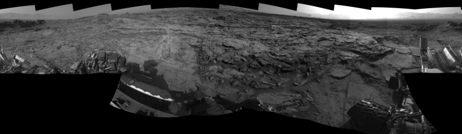 NASA's Mars rover Curiosity took 19 images in Gale Crater using its mast-mounted Left Navigation Camera (Navcam) to create this mosaic. The seam-corrected mosaic provides a 360-degree cylindrical-perspective projection panorama of the Martian surface suitable for stereo viewing, centered at 39 degrees azimuth (measured clockwise from north). This single-eye view must be combined with the partner right image to be viewed in stereo.  Curiosity took the images on September 23, 2015, Sol 1112 of the Mars Science Laboratory mission at drive 592, site number 50. The local mean solar time for the image exposures was 4 PM. Each Navcam image has a 45-degree field of view. CREDIT: NASA/JPL-Caltech