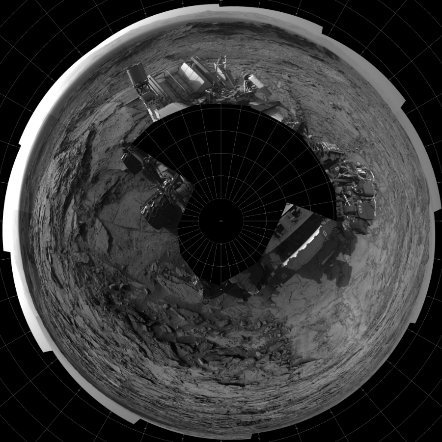 NASA's Mars rover Curiosity took 19 images in Gale Crater using its mast-mounted Left Navigation Camera (Navcam) to create this mosaic. The seam-corrected mosaic provides a polar stereographic projection panorama of the Martian surface with 0 degrees azimuth (measured clockwise from north) at the top of the image. Curiosity took the images on September 23, 2015, Sol 1112 of the Mars Science Laboratory mission at drive 592, site number 50. The local mean solar time for the image exposures was 4 PM. Each Navcam image has a 45-degree field of view. CREDIT: NASA/JPL-Caltech