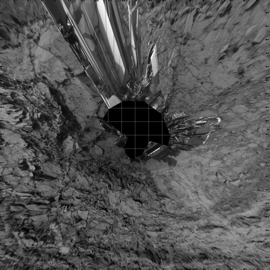 NASA's Mars rover Curiosity took 19 images in Gale Crater using its mast-mounted Left Navigation Camera (Navcam) to create this mosaic. The seam-corrected mosaic provides a vertical projection of the Martian surface near the rover, covering an area of 20 meters (north/south) by 20 meters (east/west). North is up in the image. This projection provides an overhead view, but introduces distortion for items not on the surface, such as large rocks and the rover itself.  Curiosity took the images on September 23, 2015, Sol 1112 of the Mars Science Laboratory mission at drive 592, site number 50. The local mean solar time for the image exposures was 4 PM. Each Navcam image has a 45-degree field of view. CREDIT: NASA/JPL-Caltech