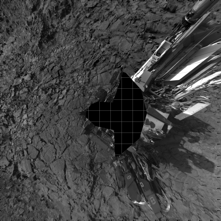 NASA's Mars rover Curiosity took 19 images in Gale Crater using its mast-mounted Left Navigation Camera (Navcam) to create this mosaic. The seam-corrected mosaic provides a vertical projection of the Martian surface near the rover, covering an area of 20 meters (north/south) by 20 meters (east/west). North is up in the image. This projection provides an overhead view, but introduces distortion for items not on the surface, such as large rocks and the rover itself.  Curiosity took the images on October 30, 2015, Sol 1148 of the Mars Science Laboratory mission at drive 1116, site number 50. The local mean solar time for the image exposures was 4 PM. Each Navcam image has a 45-degree field of view. CREDIT: NASA/JPL-Caltech