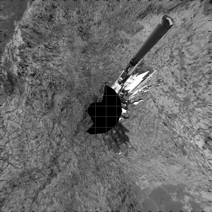 NASA's Mars rover Curiosity took 17 images in Gale Crater using its mast-mounted Left Navigation Camera (Navcam) to create this mosaic. The seam-corrected mosaic provides a vertical projection of the Martian surface near the rover, covering an area of 20 meters (north/south) by 20 meters (east/west). North is up in the image. This projection provides an overhead view, but introduces distortion for items not on the surface, such as large rocks and the rover itself.  Curiosity took the images on November 04, 2015, Sol 1153 of the Mars Science Laboratory mission at drive 1624, site number 50. The local mean solar time for the image exposures was 4 PM. Each Navcam image has a 45-degree field of view. CREDIT: NASA/JPL-Caltech