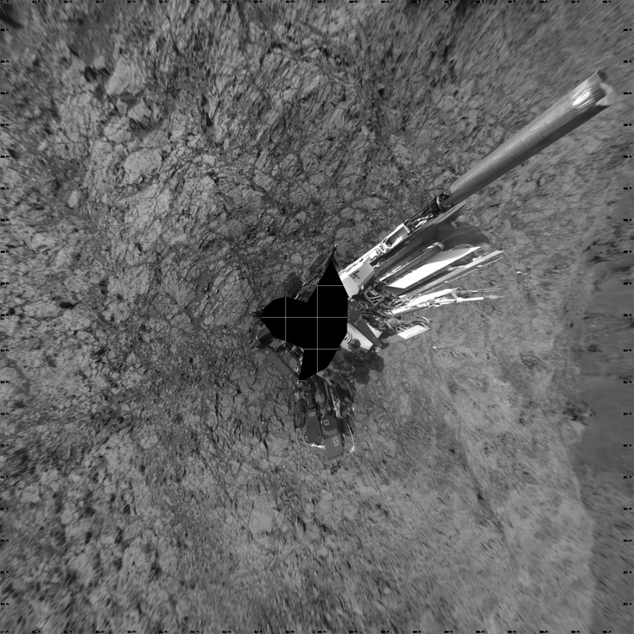 NASA's Mars rover Curiosity took 19 images in Gale Crater using its mast-mounted Left Navigation Camera (Navcam) to create this mosaic. The seam-corrected mosaic provides a vertical projection of the Martian surface near the rover, covering an area of 20 meters (north/south) by 20 meters (east/west). North is up in the image. This projection provides an overhead view, but introduces distortion for items not on the surface, such as large rocks and the rover itself. Curiosity took the images on November 06, 2015, Sol 1155 of the Mars Science Laboratory mission at drive 1928, site number 50. The local mean solar time for the image exposures was 4 PM. Each Navcam image has a 45-degree field of view. CREDIT: NASA/JPL-Caltech