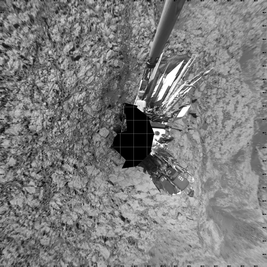 NASA's Mars rover Curiosity took 17 images in Gale Crater using its mast-mounted Left Navigation Camera (Navcam) to create this mosaic. The seam-corrected mosaic provides a vertical projection of the Martian surface near the rover, covering an area of 20 meters (north/south) by 20 meters (east/west). North is up in the image. This projection provides an overhead view, but introduces distortion for items not on the surface, such as large rocks and the rover itself.  Curiosity took the images on November 18, 2015, Sol 1167 of the Mars Science Laboratory mission at drive 0, site number 51. The local mean solar time for the image exposures was from 2 PM to 3 PM. Each Navcam image has a 45-degree field of view. CREDIT: NASA/JPL-Caltech