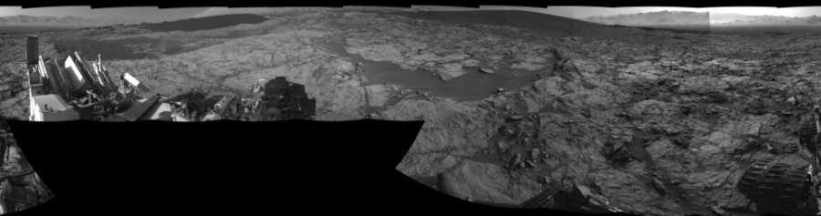 NASA's Mars rover Curiosity took 17 images in Gale Crater using its mast-mounted Left Navigation Camera (Navcam) to create this mosaic. The seam-corrected mosaic provides a 360-degree cylindrical-perspective projection panorama of the Martian surface suitable for stereo viewing, centered at 355 degrees azimuth (measured clockwise from north). This single-eye view must be combined with the partner right image to be viewed in stereo.  Curiosity took the images on November 24, 2015, Sol 1173 of the Mars Science Laboratory mission at drive 874, site number 51. The local mean solar time for the image exposures was from 2 PM to 4 PM. Each Navcam image has a 45-degree field of view. CREDIT: NASA/JPL-Caltech