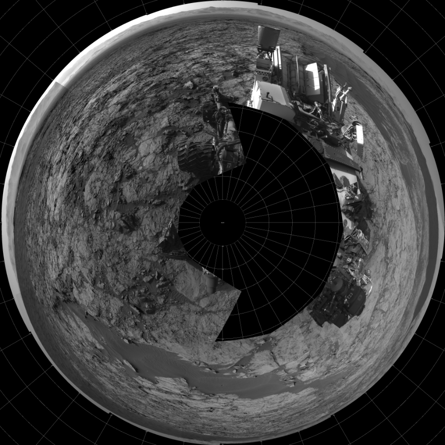 NASA's Mars rover Curiosity took 17 images in Gale Crater using its mast-mounted Left Navigation Camera (Navcam) to create this mosaic. The seam-corrected mosaic provides a polar stereographic projection panorama of the Martian surface with 0 degrees azimuth (measured clockwise from north) at the top of the image. Curiosity took the images on November 24, 2015, Sol 1173 of the Mars Science Laboratory mission at drive 874, site number 51. The local mean solar time for the image exposures was from 2 PM to 4 PM. Each Navcam image has a 45-degree field of view. CREDIT: NASA/JPL-Caltech