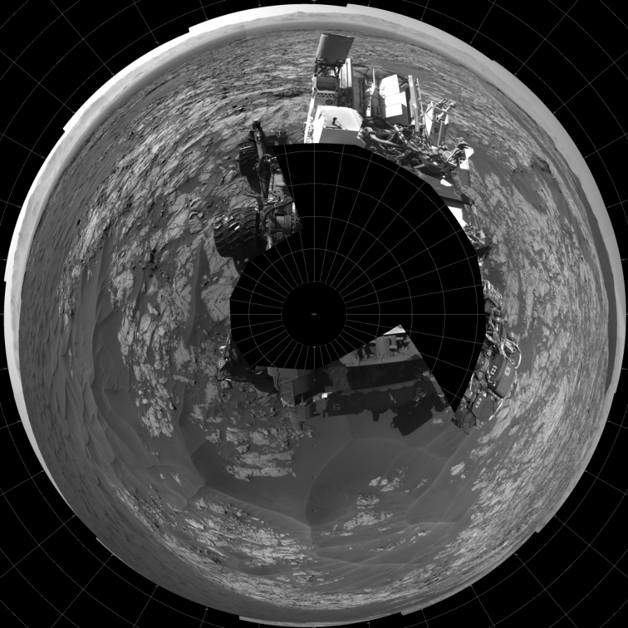 NASA's Mars rover Curiosity took 19 images in Gale Crater using its mast-mounted Left Navigation Camera (Navcam) to create this mosaic. The seam-corrected mosaic provides a polar stereographic projection panorama of the Martian surface with 0 degrees azimuth (measured clockwise from north) at the top of the image. Curiosity took the images on November 25, 2015, Sol 1174 of the Mars Science Laboratory mission at drive 1102, site number 51. The local mean solar time for the image exposures was 2 PM. Each Navcam image has a 45-degree field of view. CREDIT: NASA/JPL-Caltech