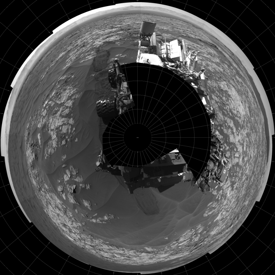 NASA's Mars rover Curiosity took 19 images in Gale Crater using its mast-mounted Left Navigation Camera (Navcam) to create this mosaic. The seam-corrected mosaic provides a polar stereographic projection panorama of the Martian surface with 0 degrees azimuth (measured clockwise from north) at the top of the image. Curiosity took the images on December 03, 2015, Sol 1181 of the Mars Science Laboratory mission at drive 1298, site number 51. The local mean solar time for the image exposures was 1 PM. Each Navcam image has a 45-degree field of view. CREDIT: NASA/JPL-Caltech