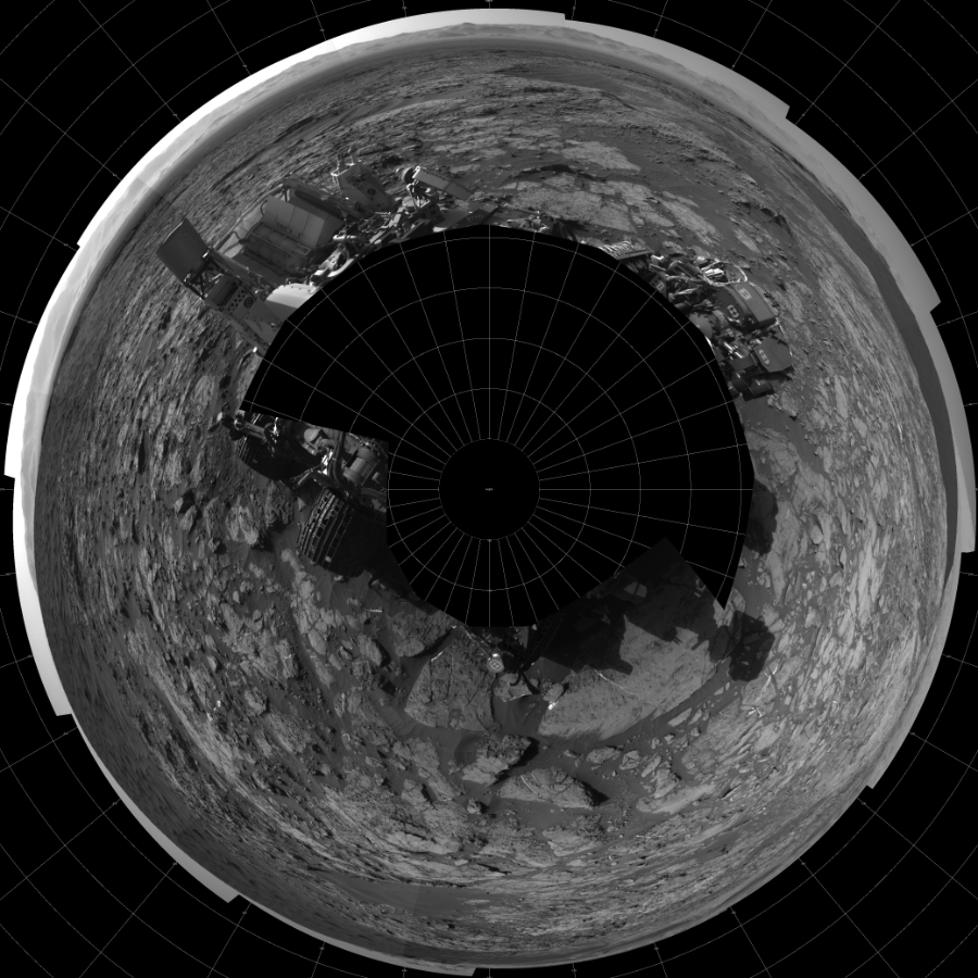 NASA's Mars rover Curiosity took 17 images in Gale Crater using its mast-mounted Left Navigation Camera (Navcam) to create this mosaic. The seam-corrected mosaic provides a polar stereographic projection panorama of the Martian surface with 0 degrees azimuth (measured clockwise from north) at the top of the image. Curiosity took the images on December 07, 2015, Sol 1185 of the Mars Science Laboratory mission at drive 1800, site number 51. The local mean solar time for the image exposures was 3 PM. Each Navcam image has a 45-degree field of view. CREDIT: NASA/JPL-Caltech