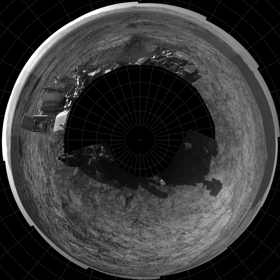 NASA's Mars rover Curiosity took 17 images in Gale Crater using its mast-mounted Left Navigation Camera (Navcam) to create this mosaic. The seam-corrected mosaic provides a polar stereographic projection panorama of the Martian surface with 0 degrees azimuth (measured clockwise from north) at the top of the image. Curiosity took the images on December 09, 2015, Sol 1187 of the Mars Science Laboratory mission at drive 2004, site number 51. The local mean solar time for the image exposures was from 3 PM to 4 PM. Each Navcam image has a 45-degree field of view. CREDIT: NASA/JPL-Caltech