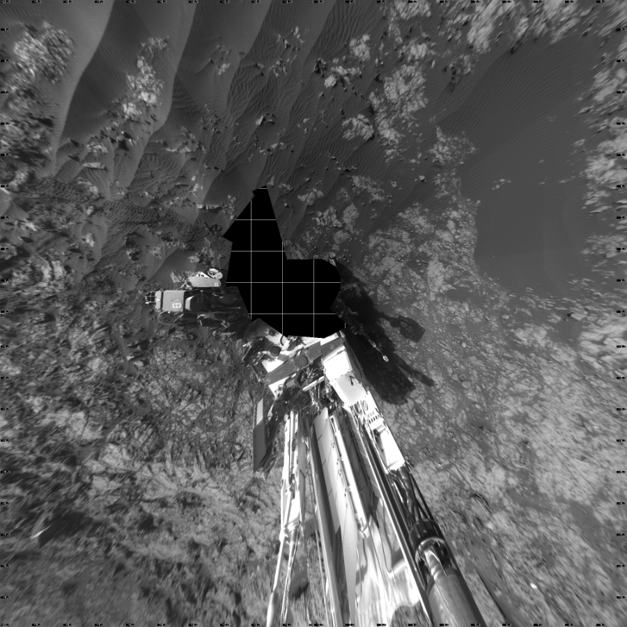 NASA's Mars rover Curiosity took 17 images in Gale Crater using its mast-mounted Left Navigation Camera (Navcam) to create this mosaic. The seam-corrected mosaic provides a vertical projection of the Martian surface near the rover, covering an area of 20 meters (north/south) by 20 meters (east/west). North is up in the image. This projection provides an overhead view, but introduces distortion for items not on the surface, such as large rocks and the rover itself.  Curiosity took the images on December 16, 2015, Sol 1194 of the Mars Science Laboratory mission at drive 2704, site number 51. The local mean solar time for the image exposures was 4 PM. Each Navcam image has a 45-degree field of view. CREDIT: NASA/JPL-Caltech