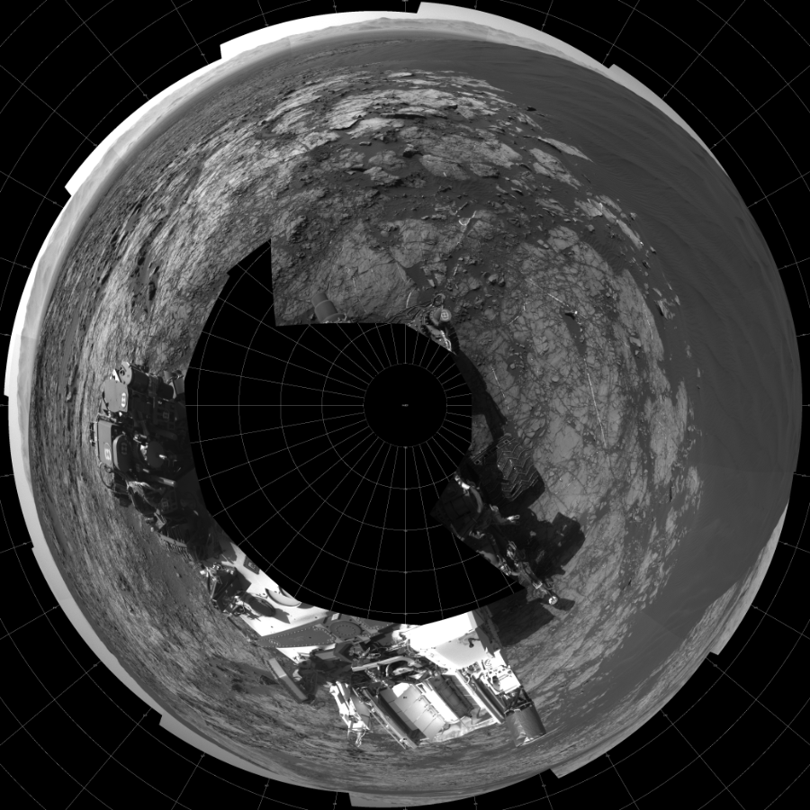 NASA's Mars rover Curiosity took 17 images in Gale Crater using its mast-mounted Left Navigation Camera (Navcam) to create this mosaic. The seam-corrected mosaic provides a polar stereographic projection panorama of the Martian surface with 0 degrees azimuth (measured clockwise from north) at the top of the image. Curiosity took the images on January 07, 2016, Sol 1215 of the Mars Science Laboratory mission at drive 614, site number 52. The local mean solar time for the image exposures was 2 PM. Each Navcam image has a 45-degree field of view. CREDIT: NASA/JPL-Caltech