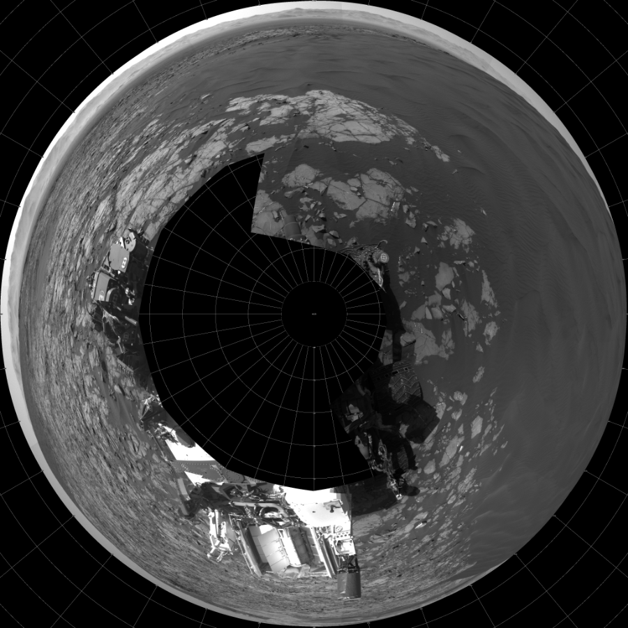 NASA's Mars rover Curiosity took 21 images in Gale Crater using its mast-mounted Left Navigation Camera (Navcam) to create this mosaic. The seam-corrected mosaic provides a polar stereographic projection panorama of the Martian surface with 0 degrees azimuth (measured clockwise from north) at the top of the image. Curiosity took the images on January 08, 2016, Sol 1216 of the Mars Science Laboratory mission at drive 936, site number 52. The local mean solar time for the image exposures was 2 PM. Each Navcam image has a 45-degree field of view. CREDIT: NASA/JPL-Caltech