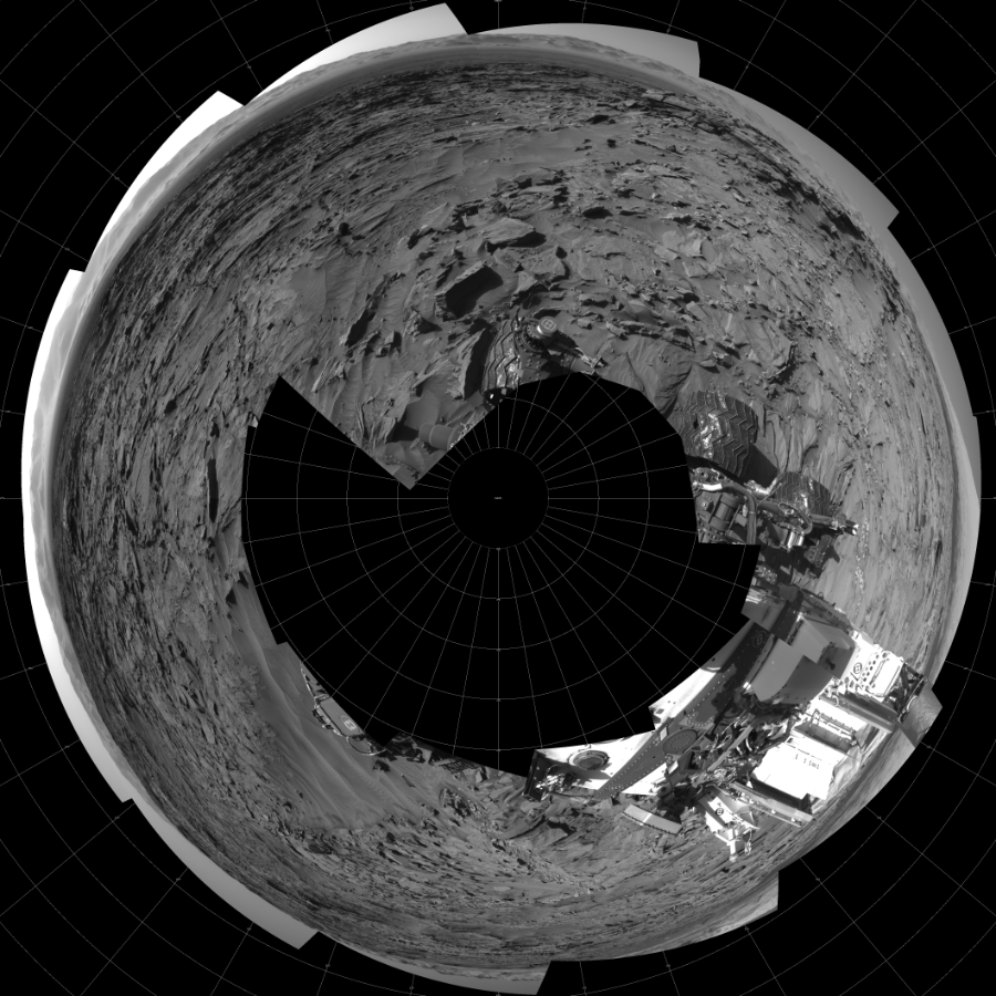 NASA's Mars rover Curiosity took 17 images in Gale Crater using its mast-mounted Left Navigation Camera (Navcam) to create this mosaic. The seam-corrected mosaic provides a polar stereographic projection panorama of the Martian surface with 0 degrees azimuth (measured clockwise from north) at the top of the image. Curiosity took the images on March 30, 2016, Sol 1296 of the Mars Science Laboratory mission at drive 2644, site number 53. The local mean solar time for the image exposures was 4 PM. Each Navcam image has a 45-degree field of view. CREDIT: NASA/JPL-Caltech