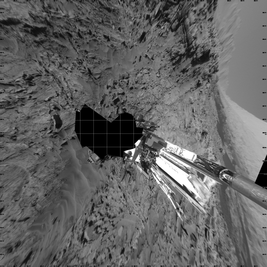 NASA's Mars rover Curiosity took 17 images in Gale Crater using its mast-mounted Left Navigation Camera (Navcam) to create this mosaic. The seam-corrected mosaic provides a vertical projection of the Martian surface near the rover, covering an area of 20 meters (north/south) by 20 meters (east/west). North is up in the image. This projection provides an overhead view, but introduces distortion for items not on the surface, such as large rocks and the rover itself.  Curiosity took the images on March 30, 2016, Sol 1296 of the Mars Science Laboratory mission at drive 2644, site number 53. The local mean solar time for the image exposures was 4 PM. Each Navcam image has a 45-degree field of view. CREDIT: NASA/JPL-Caltech