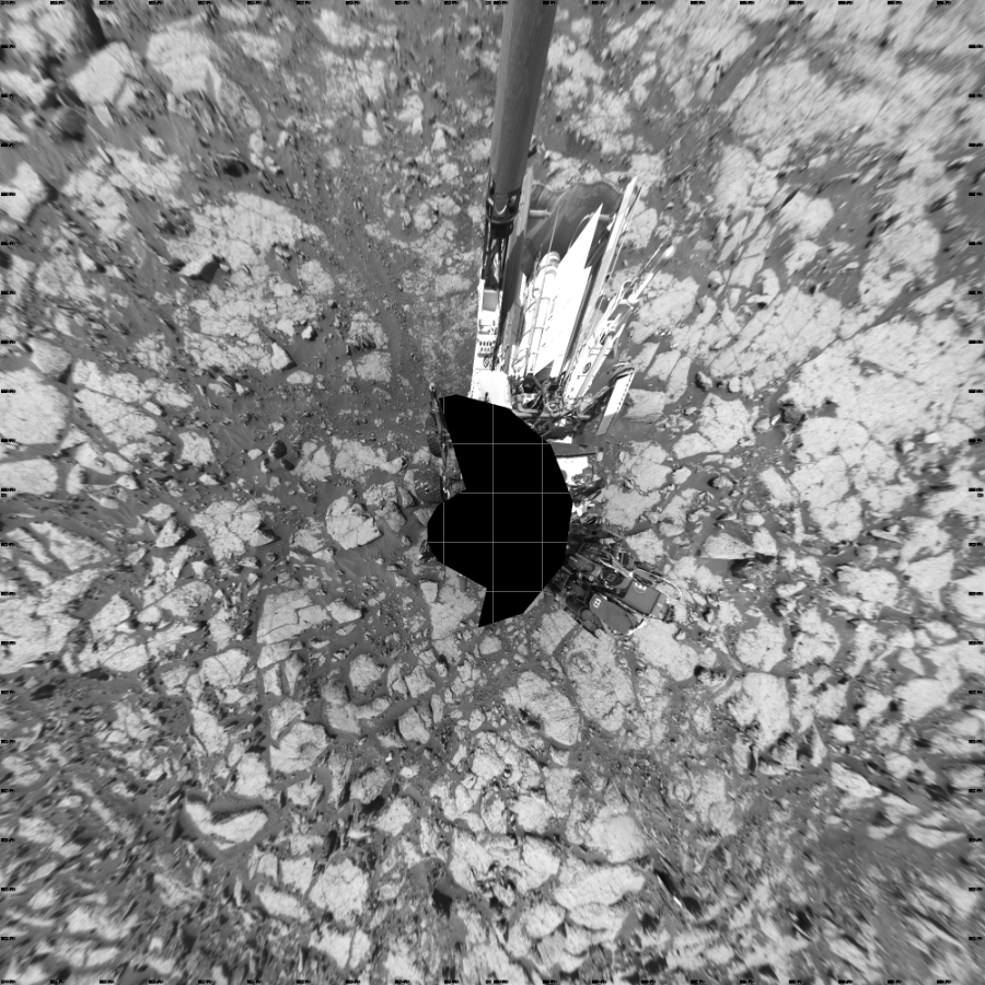 NASA's Mars rover Curiosity took 17 images in Gale Crater using its mast-mounted Left Navigation Camera (Navcam) to create this mosaic. The seam-corrected mosaic provides a vertical projection of the Martian surface near the rover, covering an area of 20 meters (north/south) by 20 meters (east/west). North is up in the image. This projection provides an overhead view, but introduces distortion for items not on the surface, such as large rocks and the rover itself. Curiosity took the images on August 18, 2016, Sol 1433 of the Mars Science Laboratory mission at drive 0, site number 57. The local mean solar time for the image exposures was 1 PM. Each Navcam image has a 45-degree field of view. CREDIT: NASA/JPL-Caltech