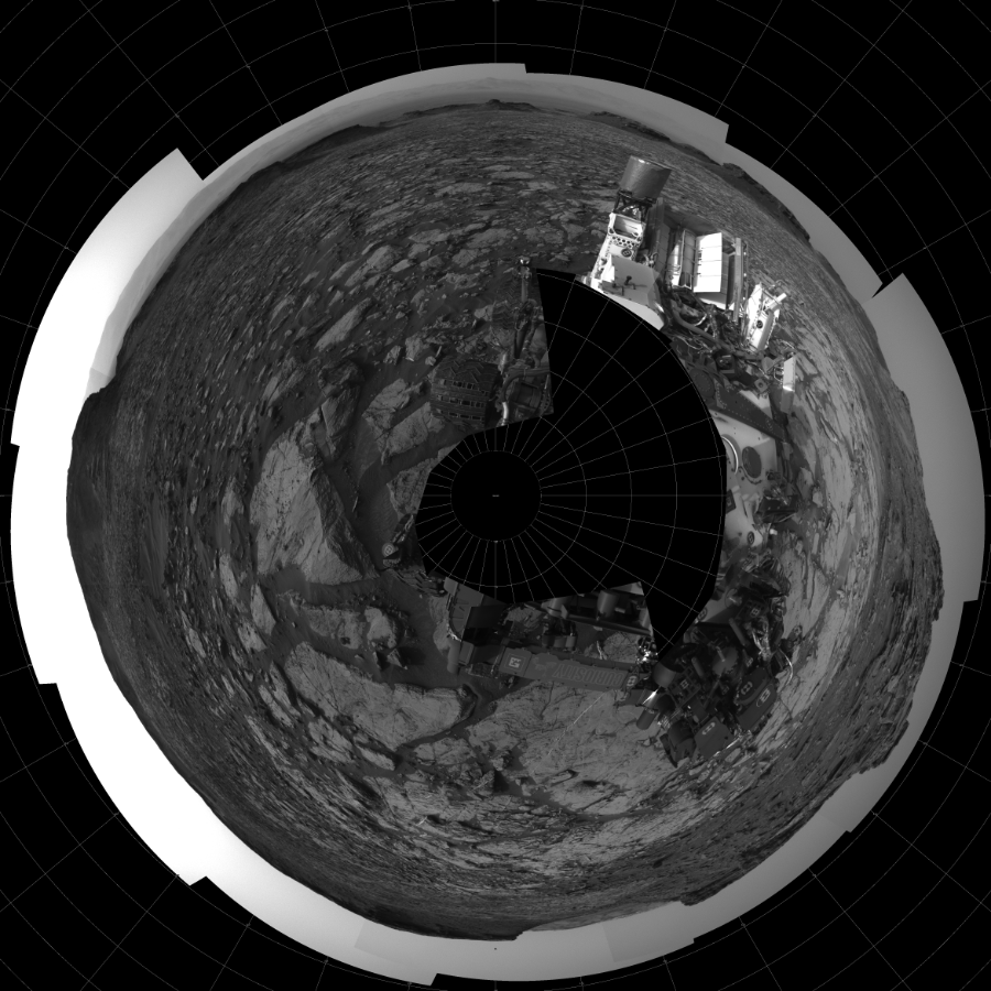 NASA's Mars rover Curiosity took 27 images in Gale Crater using its mast-mounted Left Navigation Camera (Navcam) to create this mosaic. The seam-corrected mosaic provides a polar stereographic projection panorama of the Martian surface with 0 degrees azimuth (measured clockwise from north) at the top of the image. Curiosity took the images on August 31, 2016, Sol 1446 of the Mars Science Laboratory mission at drive 1392, site number 57. The local mean solar time for the image exposures was 4 PM. Each Navcam image has a 45-degree field of view. CREDIT: NASA/JPL-Caltech