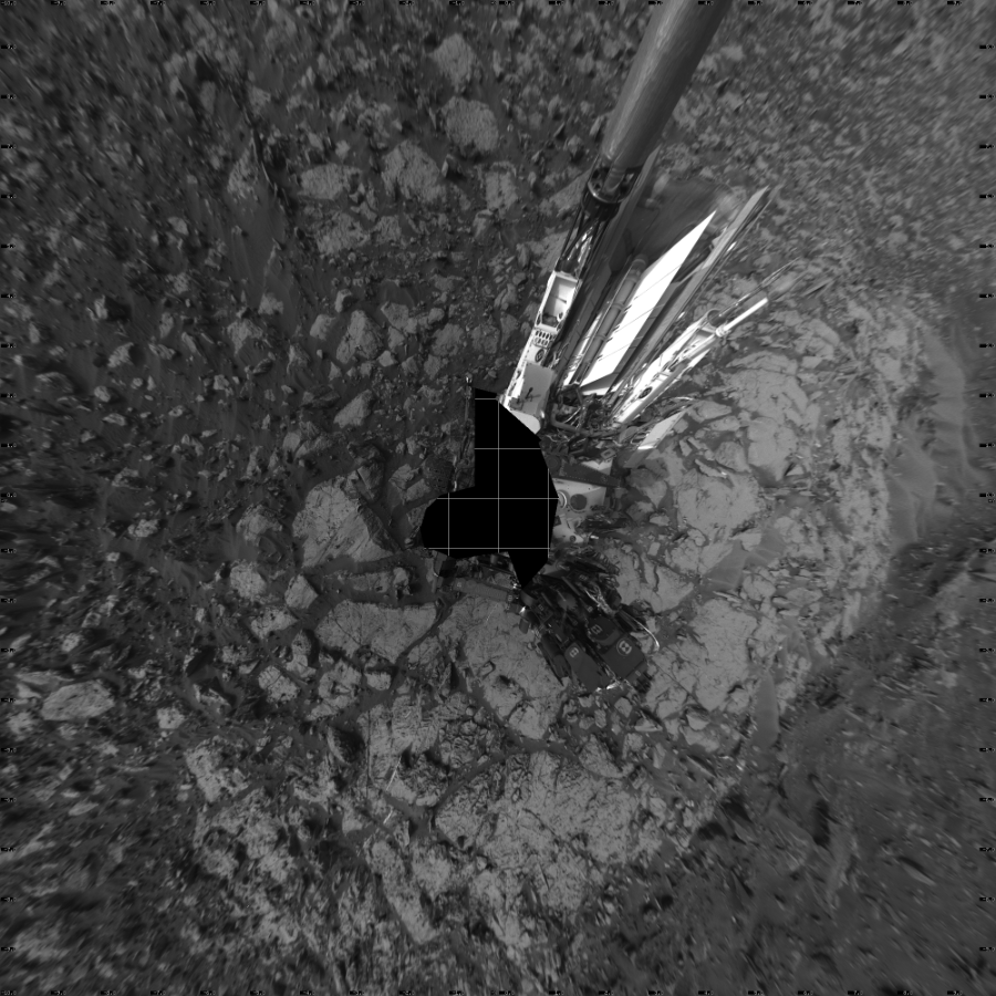 NASA's Mars rover Curiosity took 27 images in Gale Crater using its mast-mounted Left Navigation Camera (Navcam) to create this mosaic. The seam-corrected mosaic provides a vertical projection of the Martian surface near the rover, covering an area of 20 meters (north/south) by 20 meters (east/west). North is up in the image. This projection provides an overhead view, but introduces distortion for items not on the surface, such as large rocks and the rover itself.  Curiosity took the images on August 31, 2016, Sol 1446 of the Mars Science Laboratory mission at drive 1392, site number 57. The local mean solar time for the image exposures was 4 PM. Each Navcam image has a 45-degree field of view. CREDIT: NASA/JPL-Caltech