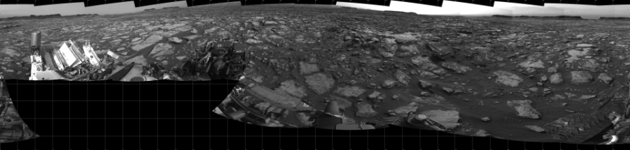 NASA's Mars rover Curiosity took 19 images in Gale Crater using its mast-mounted Left Navigation Camera (Navcam) to create this mosaic. The seam-corrected mosaic provides a 360-degree cylindrical projection panorama of the Martian surface centered at 180 degrees azimuth (measured clockwise from north). Curiosity took the images on September 30, 2016, Sol 1475 of the Mars Science Laboratory mission at drive 912, site number 58. The local mean solar time for the image exposures was 3 PM. Each Navcam image has a 45 degree field of view. CREDIT: NASA/JPL-Caltech