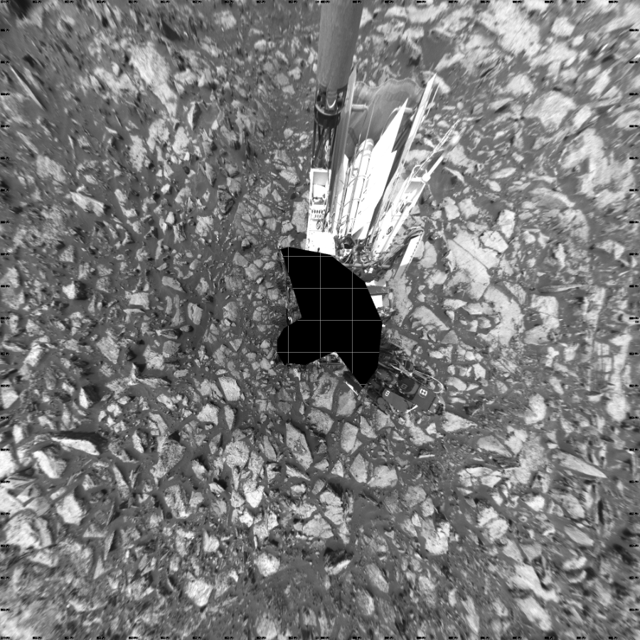 NASA's Mars rover Curiosity took 19 images in Gale Crater using its mast-mounted Left Navigation Camera (Navcam) to create this mosaic. The seam-corrected mosaic provides a vertical projection of the Martian surface near the rover, covering an area of 20 meters (north/south) by 20 meters (east/west). North is up in the image. This projection provides an overhead view, but introduces distortion for items not on the surface, such as large rocks and the rover itself.  Curiosity took the images on October 03, 2016, Sol 1478 of the Mars Science Laboratory mission at drive 1002, site number 58. The local mean solar time for the image exposures was 1 PM. Each Navcam image has a 45-degree field of view. CREDIT: NASA/JPL-Caltech