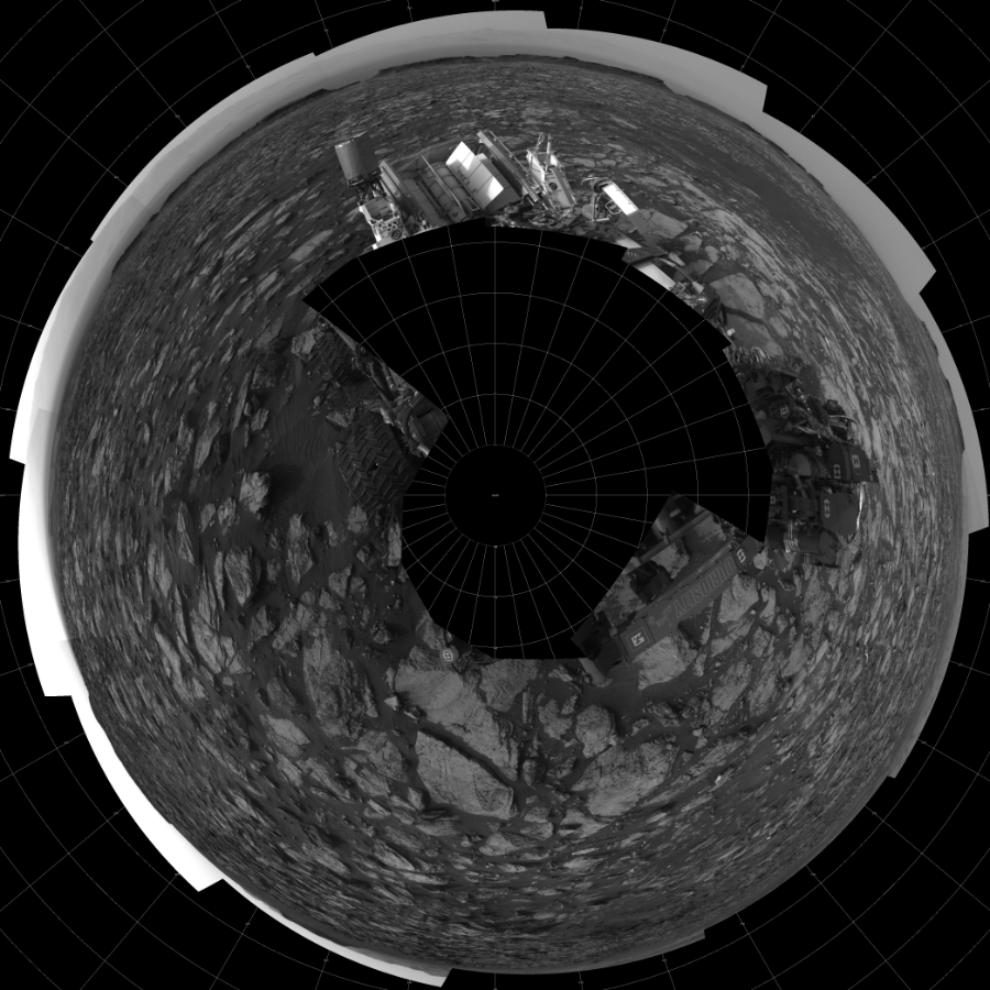 NASA's Mars rover Curiosity took 18 images in Gale Crater using its mast-mounted Left Navigation Camera (Navcam) to create this mosaic. The seam-corrected mosaic provides a polar stereographic projection panorama of the Martian surface with 0 degrees azimuth (measured clockwise from north) at the top of the image. Curiosity took the images on October 07, 2016, Sols 1482-1483 of the Mars Science Laboratory mission at drive 1572, site number 58. The local mean solar time for the image exposures was from 2 PM to 4 PM. Each Navcam image has a 45-degree field of view. CREDIT: NASA/JPL-Caltech