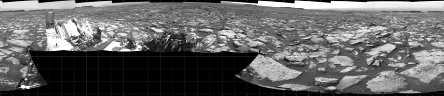 NASA's Mars rover Curiosity took 17 images in Gale Crater using its mast-mounted Left Navigation Camera (Navcam) to create this mosaic. The seam-corrected mosaic provides a 360-degree cylindrical projection panorama of the Martian surface centered at 180 degrees azimuth (measured clockwise from north). Curiosity took the images on October 24, 2016, Sol 1499 of the Mars Science Laboratory mission at drive 2136, site number 58. The local mean solar time for the image exposures was 1 PM. Each Navcam image has a 45 degree field of view. CREDIT: NASA/JPL-Caltech