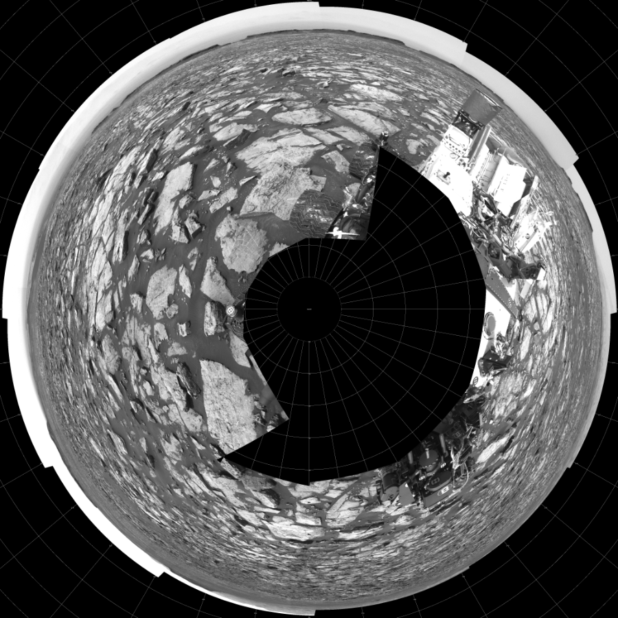 NASA's Mars rover Curiosity took 17 images in Gale Crater using its mast-mounted Left Navigation Camera (Navcam) to create this mosaic. The seam-corrected mosaic provides a polar stereographic projection panorama of the Martian surface with 0 degrees azimuth (measured clockwise from north) at the top of the image. Curiosity took the images on October 24, 2016, Sol 1499 of the Mars Science Laboratory mission at drive 2136, site number 58. The local mean solar time for the image exposures was 1 PM. Each Navcam image has a 45-degree field of view. CREDIT: NASA/JPL-Caltech
