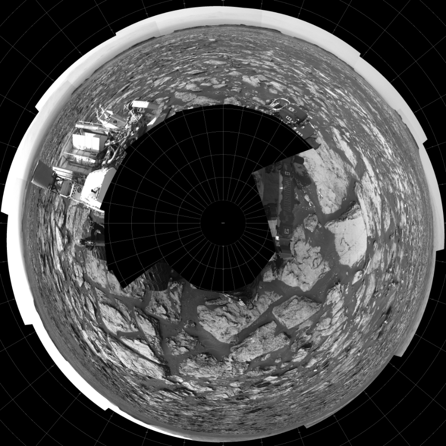 NASA's Mars rover Curiosity took 17 images in Gale Crater using its mast-mounted Left Navigation Camera (Navcam) to create this mosaic. The seam-corrected mosaic provides a polar stereographic projection panorama of the Martian surface with 0 degrees azimuth (measured clockwise from north) at the top of the image. Curiosity took the images on October 25, 2016, Sol 1500 of the Mars Science Laboratory mission at drive 2394, site number 58. The local mean solar time for the image exposures was 2 PM. Each Navcam image has a 45-degree field of view. CREDIT: NASA/JPL-Caltech