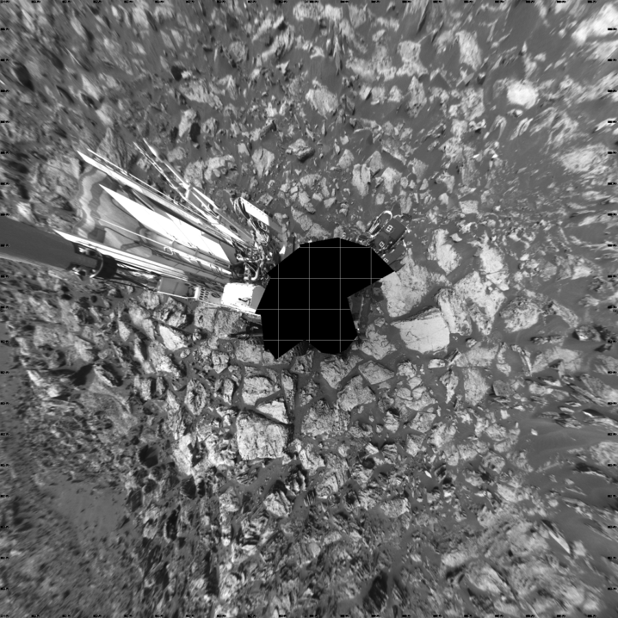 NASA's Mars rover Curiosity took 17 images in Gale Crater using its mast-mounted Left Navigation Camera (Navcam) to create this mosaic. The seam-corrected mosaic provides a vertical projection of the Martian surface near the rover, covering an area of 20 meters (north/south) by 20 meters (east/west). North is up in the image. This projection provides an overhead view, but introduces distortion for items not on the surface, such as large rocks and the rover itself.  Curiosity took the images on October 25, 2016, Sol 1500 of the Mars Science Laboratory mission at drive 2394, site number 58. The local mean solar time for the image exposures was 2 PM. Each Navcam image has a 45-degree field of view. CREDIT: NASA/JPL-Caltech