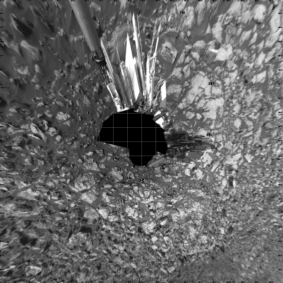 NASA's Mars rover Curiosity took 17 images in Gale Crater using its mast-mounted Left Navigation Camera (Navcam) to create this mosaic. The seam-corrected mosaic provides a vertical projection of the Martian surface near the rover, covering an area of 20 meters (north/south) by 20 meters (east/west). North is up in the image. This projection provides an overhead view, but introduces distortion for items not on the surface, such as large rocks and the rover itself.  Curiosity took the images on October 26, 2016, Sol 1501 of the Mars Science Laboratory mission at drive 2760, site number 58. The local mean solar time for the image exposures was 2 PM. Each Navcam image has a 45-degree field of view. CREDIT: NASA/JPL-Caltech