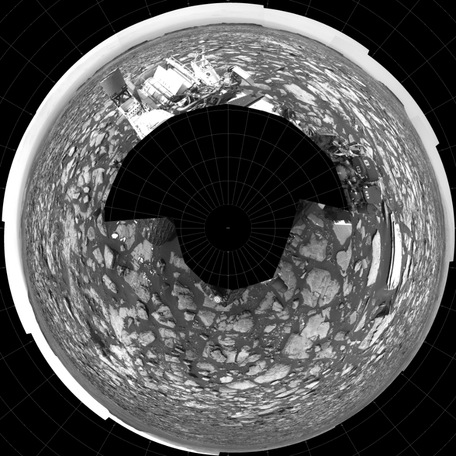 NASA's Mars rover Curiosity took 17 images in Gale Crater using its mast-mounted Left Navigation Camera (Navcam) to create this mosaic. The seam-corrected mosaic provides a polar stereographic projection panorama of the Martian surface with 0 degrees azimuth (measured clockwise from north) at the top of the image. Curiosity took the images on October 27, 2016, Sol 1502 of the Mars Science Laboratory mission at drive 2946, site number 58. The local mean solar time for the image exposures was from 1 PM to 2 PM. Each Navcam image has a 45-degree field of view. CREDIT: NASA/JPL-Caltech