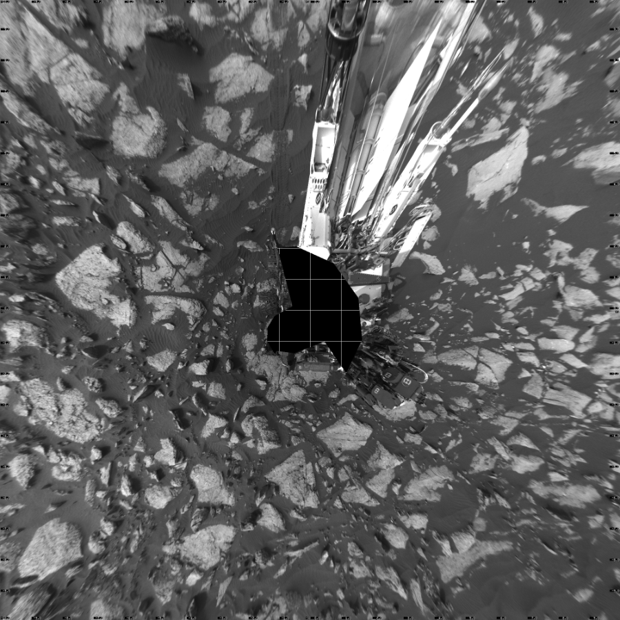 NASA's Mars rover Curiosity took 19 images in Gale Crater using its mast-mounted Left Navigation Camera (Navcam) to create this mosaic. The seam-corrected mosaic provides a vertical projection of the Martian surface near the rover, covering an area of 20 meters (north/south) by 20 meters (east/west). North is up in the image. This projection provides an overhead view, but introduces distortion for items not on the surface, such as large rocks and the rover itself.  Curiosity took the images on November 04, 2016, Sol 1509 of the Mars Science Laboratory mission at drive 1260, site number 59. The local mean solar time for the image exposures was 4 PM. Each Navcam image has a 45-degree field of view. CREDIT: NASA/JPL-Caltech