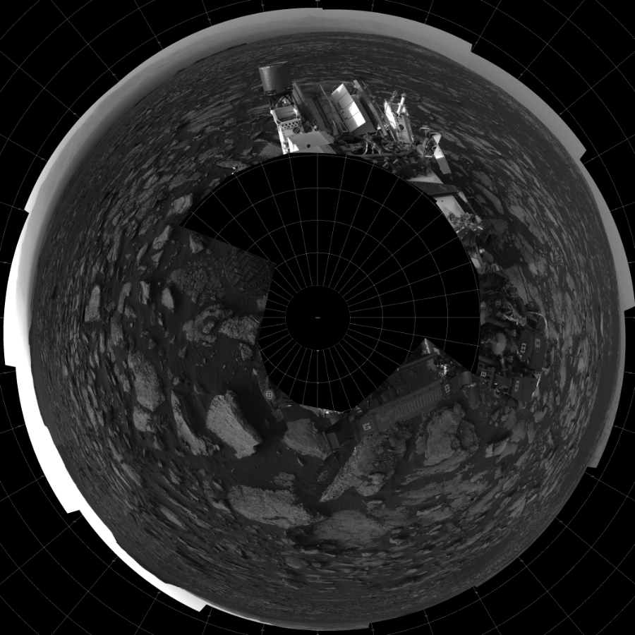 NASA's Mars rover Curiosity took 17 images in Gale Crater using its mast-mounted Left Navigation Camera (Navcam) to create this mosaic. The seam-corrected mosaic provides a polar stereographic projection panorama of the Martian surface with 0 degrees azimuth (measured clockwise from north) at the top of the image. Curiosity took the images on November 07, 2016, Sol 1512 of the Mars Science Laboratory mission at drive 1596, site number 59. The local mean solar time for the image exposures was from 4 PM to 5 PM. Each Navcam image has a 45-degree field of view. CREDIT: NASA/JPL-Caltech