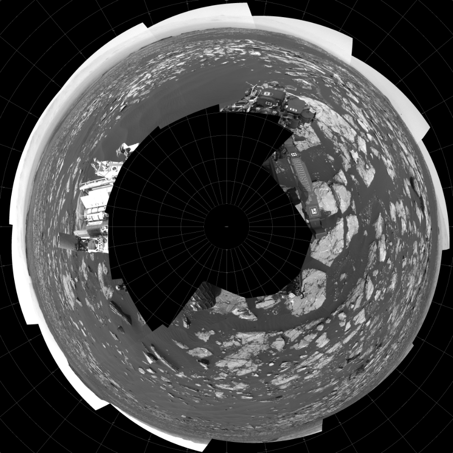 NASA's Mars rover Curiosity took 17 images in Gale Crater using its mast-mounted Left Navigation Camera (Navcam) to create this mosaic. The seam-corrected mosaic provides a polar stereographic projection panorama of the Martian surface with 0 degrees azimuth (measured clockwise from north) at the top of the image. Curiosity took the images on November 14, 2016, Sol 1519 of the Mars Science Laboratory mission at drive 2578, site number 59. The local mean solar time for the image exposures was 1 PM. Each Navcam image has a 45-degree field of view. CREDIT: NASA/JPL-Caltech